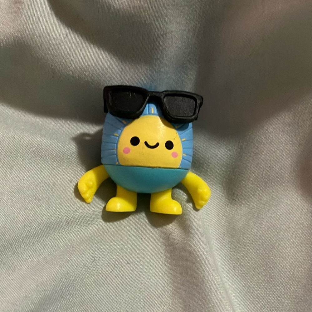 Cute Blue and Yellow Toy Figure with Sunglasses